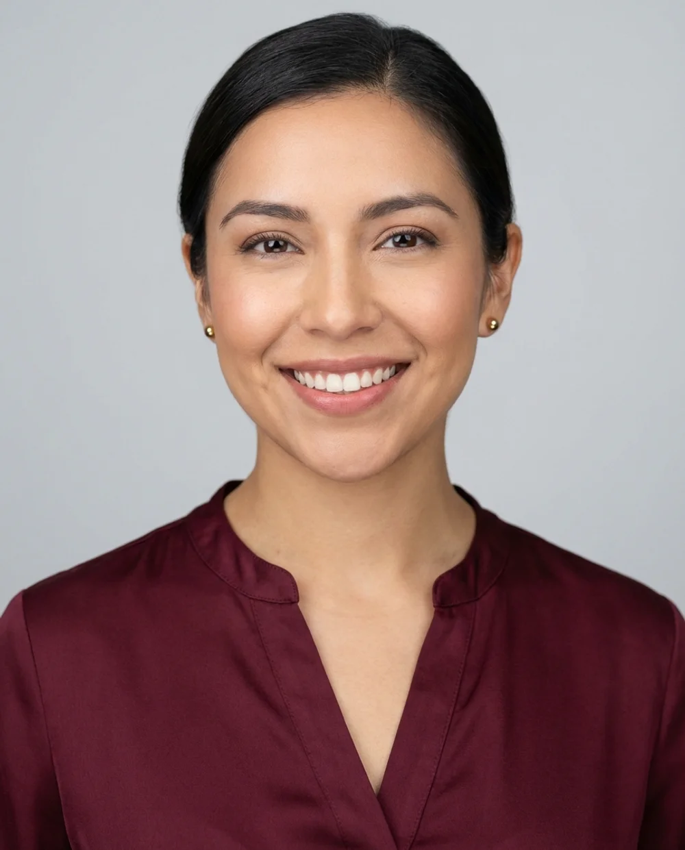 Professional headshot - woman in burgundy blouse