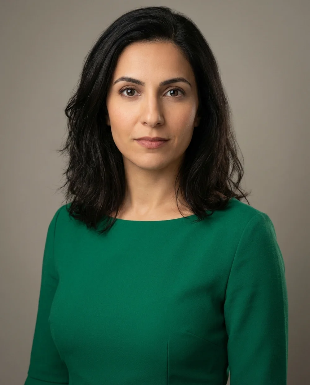 Professional headshot - woman in emerald dress